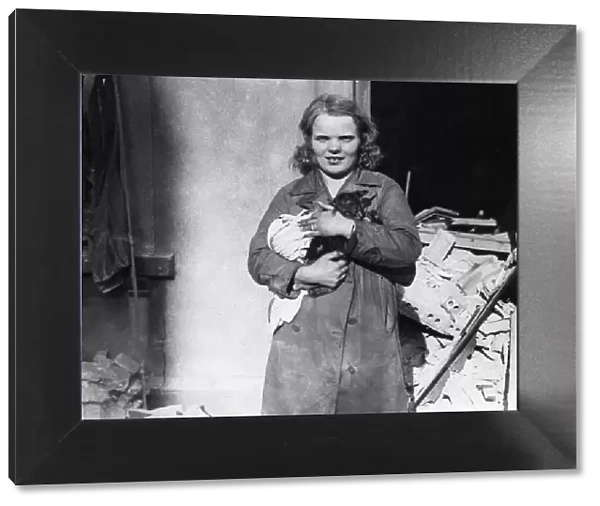 Alice Mitchell rescued, her kitten from a bombed house after an air raid by the German