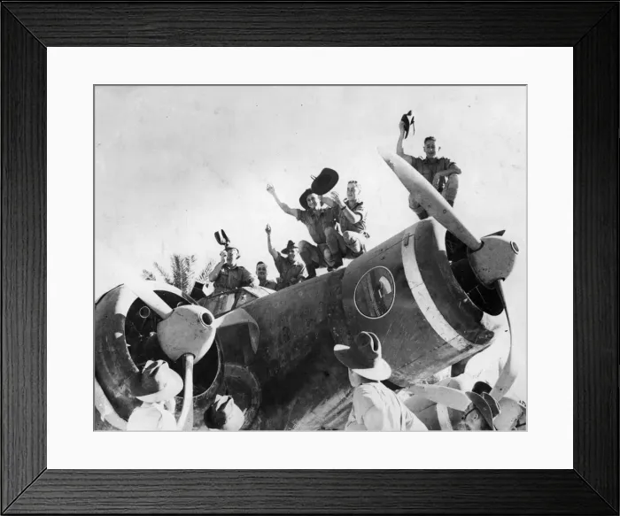 Framed Print : Australians with a captured Italian bomber in Bardia. January 1941 Framed Print : Australians with a captured Italian bomber in Bardia. January 1941