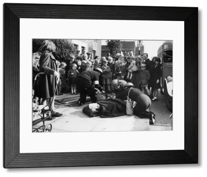 Framed Print : Britain prepares for war. A mock accident staged for training purposes shows medics Framed Print : Britain prepares for war. A mock accident staged for training purposes shows medics