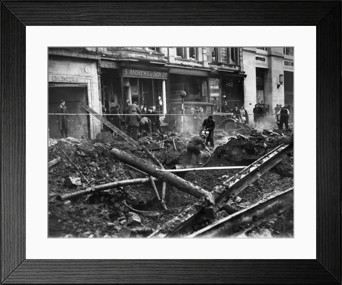 Framed Print : Bomb damage to Queens Street in Central Cardiff after an air raid by the German Luftwaffe Framed Print : Bomb damage to Queens Street in Central Cardiff after an air raid by the German Luftwaffe