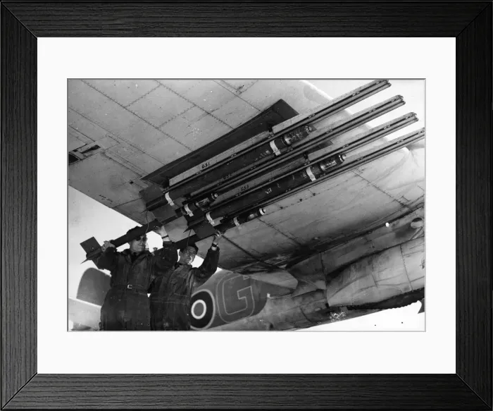 Framed Print : R. A. F ground crew equipping Beaufighters with rocket projectiles