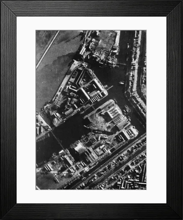 Framed Print : Aerial photograph taken from a RAF Venturas during a daylight raid on the docks at Den Framed Print : Aerial photograph taken from a RAF Venturas during a daylight raid on the docks at Den
