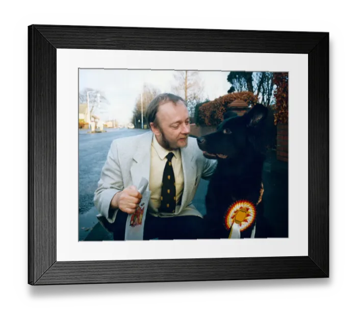 Framed Print : Mr Gary Hinson with his dog Paddy who plays the dog bought by Jack Duckworth for his wife
