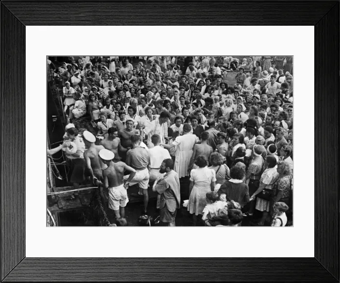 Framed Print : Women and children internees from Surabaya boarding HMS Bulolo, bound for Singapore Framed Print : Women and children internees from Surabaya boarding HMS Bulolo, bound for Singapore