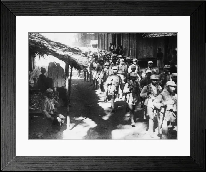 Framed Print : Chinese troops enter a Burmese village during Second World War. Circa March 1945 Framed Print : Chinese troops enter a Burmese village during Second World War. Circa March 1945