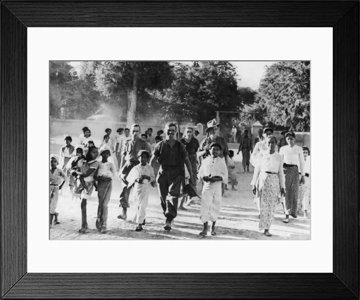 Framed Print : British soldiers and locals in the compound of the church in Chantha