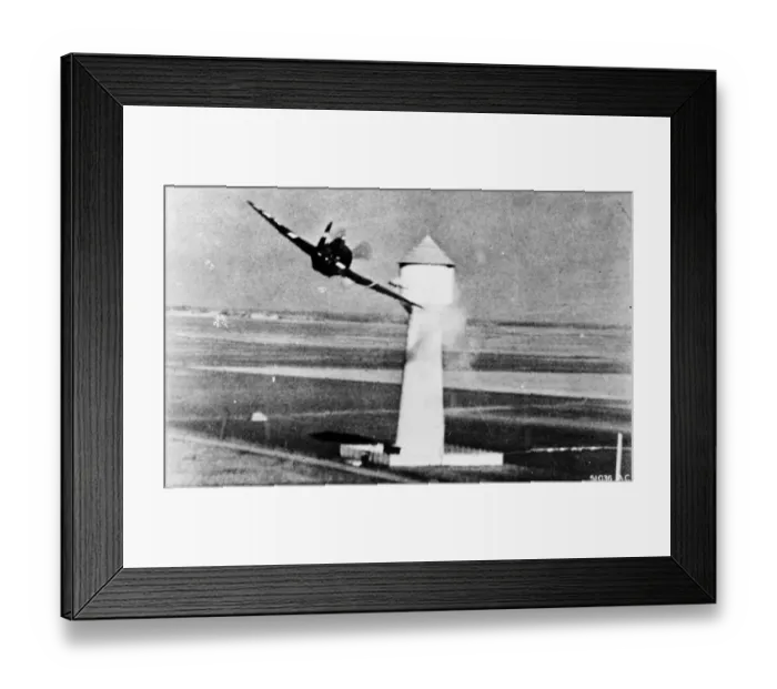 Framed Print : An 8th U. S. A. A. F. P-47 attacks a flak tower at a German aerodrome in occupied France