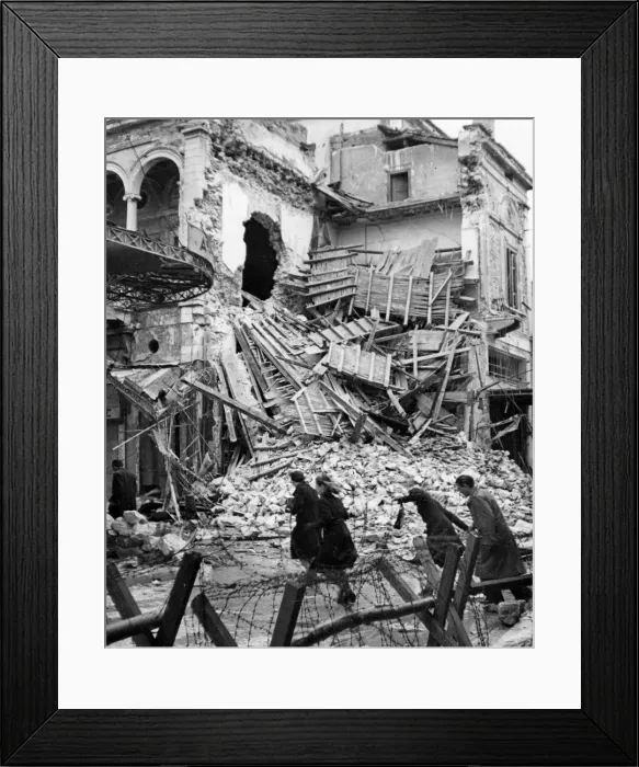 Framed Print : Civilians in Athens moving through destroyed buildings during curfew hours. January 1945