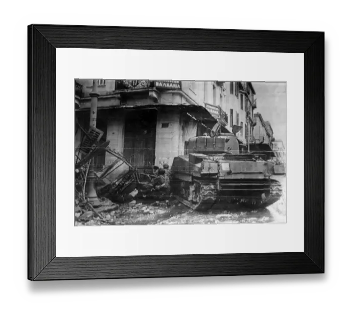 Framed Print : A tank gives cover to paratroopers as they probe the ruins of a dynamited house n Athens