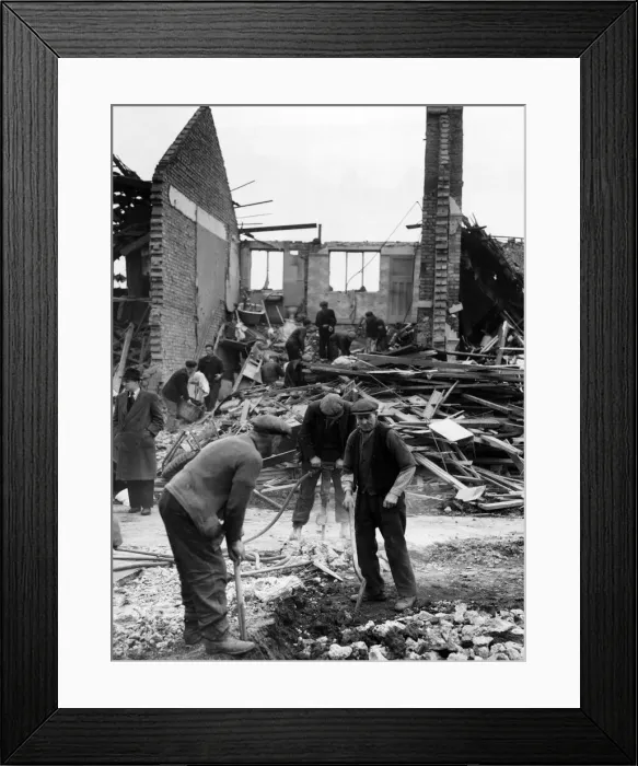 Framed Print : ARP men clearing damage after an air raid attack on London. Circa 1941 Framed Print : ARP men clearing damage after an air raid attack on London. Circa 1941
