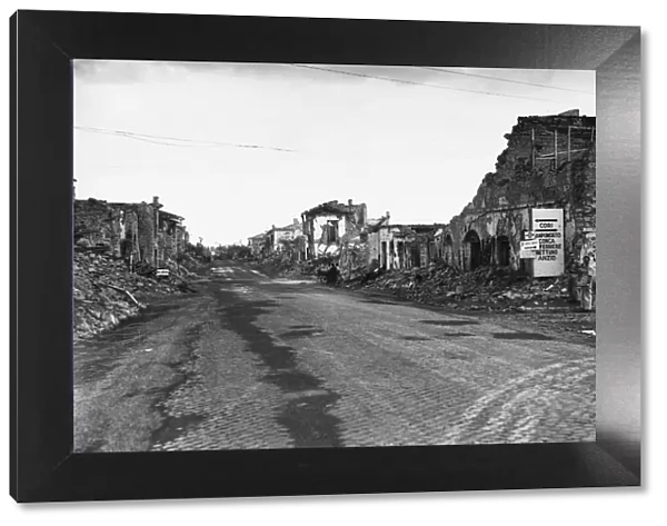 The badly battered town of Cisterna on the coast road to Rome. 29th June 1944
