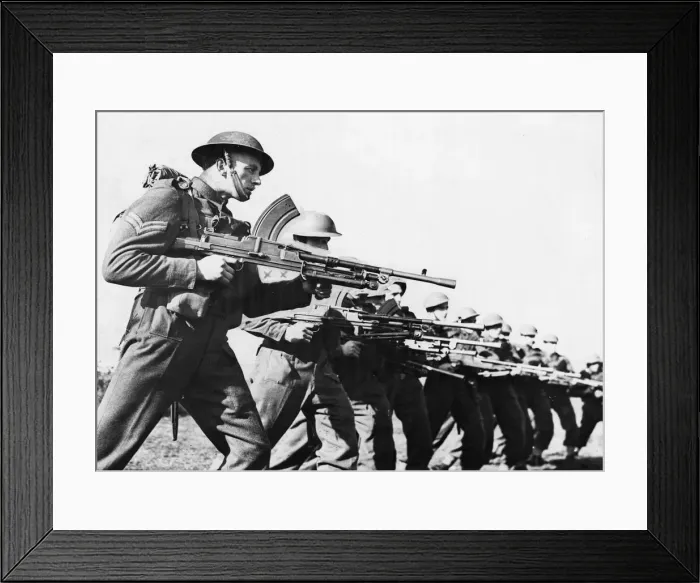 Framed Print : These men of the Duke of Cornwall Light Infantry are seen on the Sussex Downs under a Framed Print : These men of the Duke of Cornwall Light Infantry are seen on the Sussex Downs under a