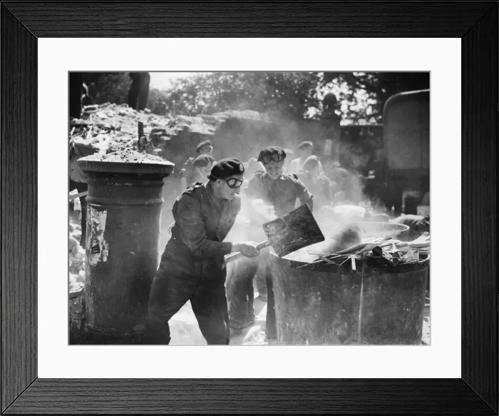 Framed Print : Fireman wearing their Second front'commando berets assisted local members of