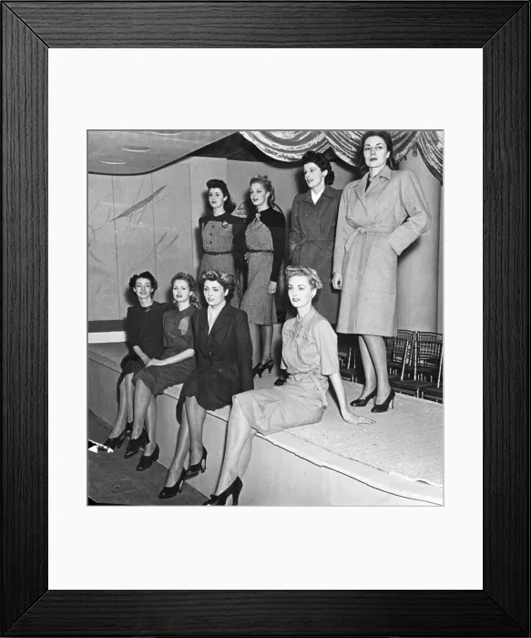Framed Print : Utility dresses modelled at Selfridges. They are made by top designers including Norman