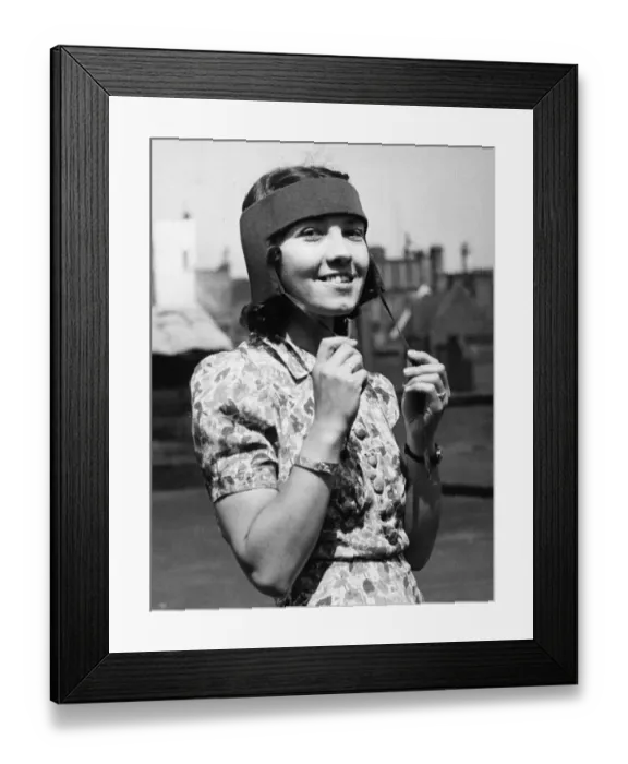 Framed Print : Picture shows a new anti concussion helmet. Picture taken 1st July 1940