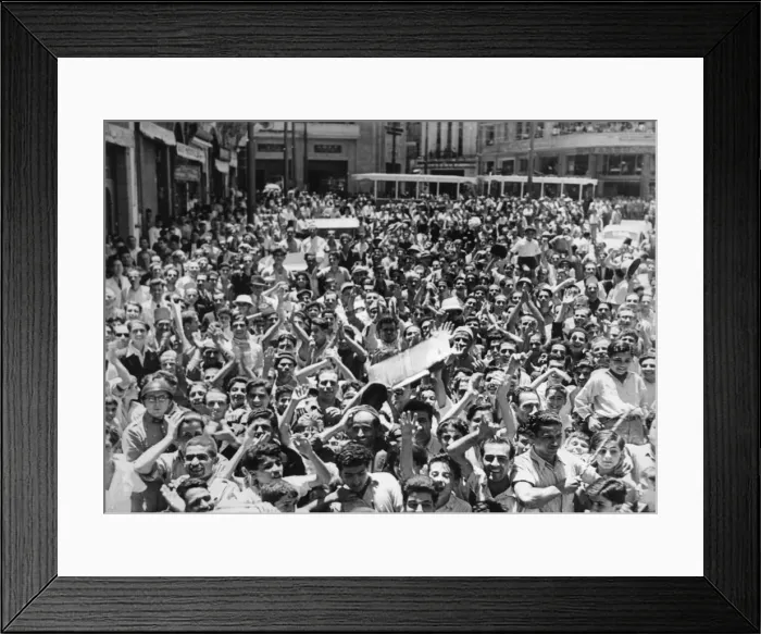 Framed Print : A crowded street in the city of Beirut as local residents turn out to cheer the British