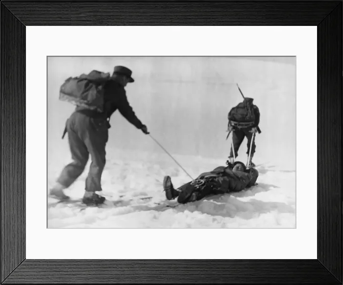 Framed Print : Raid on Spitzbergen (Svalbard). Norwegian ski troops pulling a comrade on a sledge Framed Print : Raid on Spitzbergen (Svalbard). Norwegian ski troops pulling a comrade on a sledge