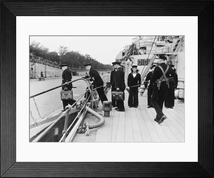 Framed Print : German naval officers followed by a Royal Marine armed sentry when leaving HMS Dido Framed Print : German naval officers followed by a Royal Marine armed sentry when leaving HMS Dido
