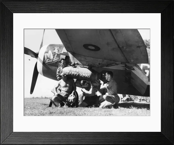 Framed Print : Four ground crew of No. 134 Squadron RAF load a 500-lb GP bomb