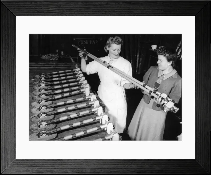 Framed Print : Female factory workers checking land mine detectors. A row of finished detector Framed Print : Female factory workers checking land mine detectors. A row of finished detector