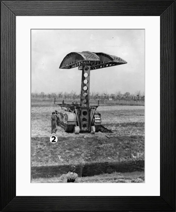 Framed Print : Hydraulic arm lifting a Scissors self propelled bridge into position. June 1945