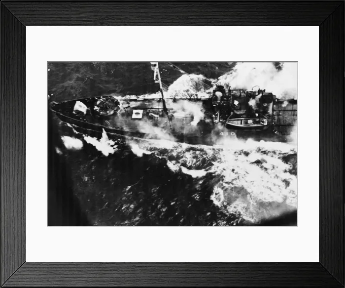Framed Print : A Japanese cargo ship attacked by a US B-24 Liberator bomber Framed Print : A Japanese cargo ship attacked by a US B-24 Liberator bomber