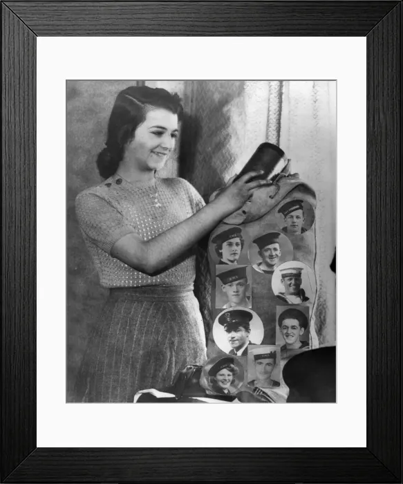 Framed Print : 16 year old Joan Brown, who has eight brothers and sisters who are in the Navy