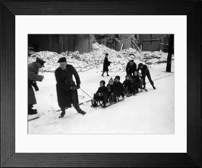 Framed Print : Snow in Berlin. Children going to school on sleighs being pulled by British Framed Print : Snow in Berlin. Children going to school on sleighs being pulled by British
