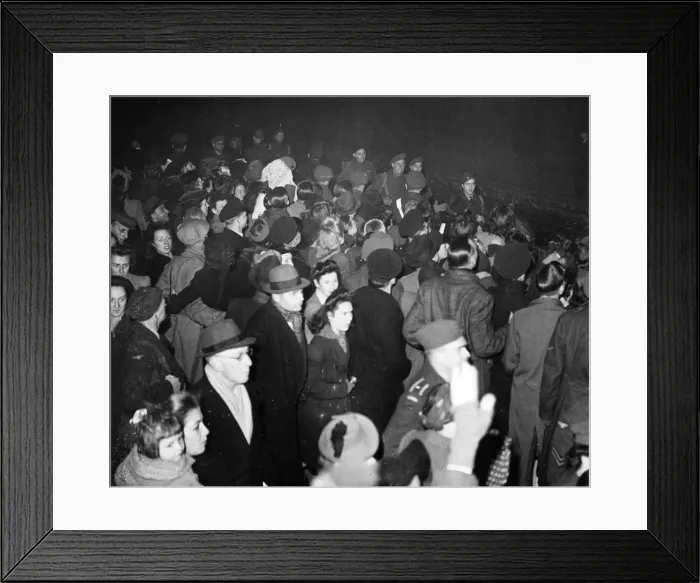 Framed Print : D Day men arrive at a London Station. 1st January 1945 Framed Print : D Day men arrive at a London Station. 1st January 1945