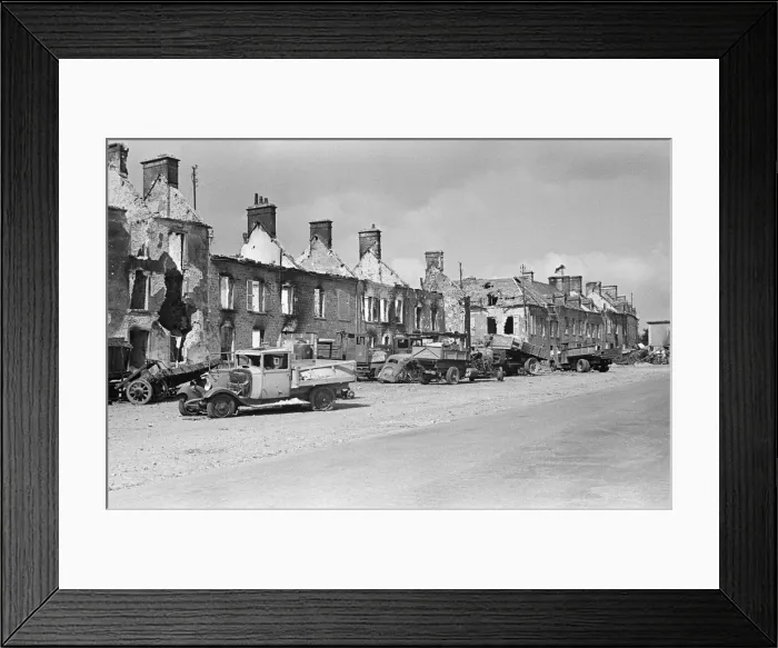 Framed Print : Ruined buildings and wrecked German transport in the streets of Montebourg as a result of Framed Print : Ruined buildings and wrecked German transport in the streets of Montebourg as a result of