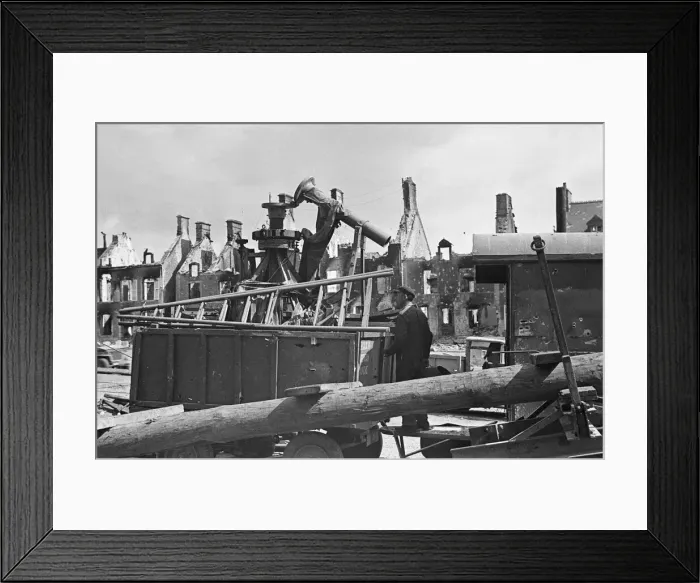 Framed Print : Ruined buildings and wrecked German transport in the streets of Montebourg as a result of Framed Print : Ruined buildings and wrecked German transport in the streets of Montebourg as a result of