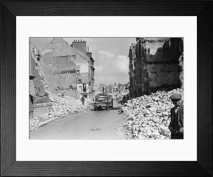 Framed Print : Ruined buildings and wrecked German transport in the streets of Montebourg as a result of Framed Print : Ruined buildings and wrecked German transport in the streets of Montebourg as a result of