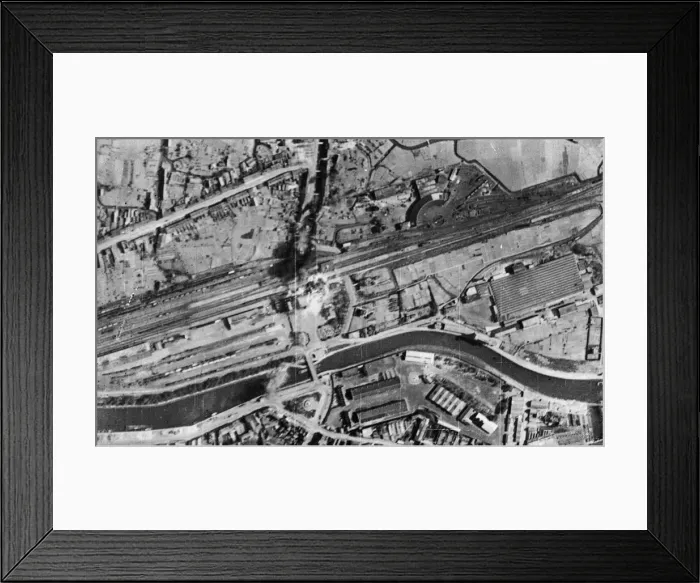 Framed Print : Bombs bursting on the railway station and sidings during a daylight attack by RAF Bomber Framed Print : Bombs bursting on the railway station and sidings during a daylight attack by RAF Bomber