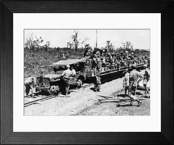 Framed Print : Allied troops use a jeep as a locomotive on the 37 mile railroad which runs from Mougang Framed Print : Allied troops use a jeep as a locomotive on the 37 mile railroad which runs from Mougang