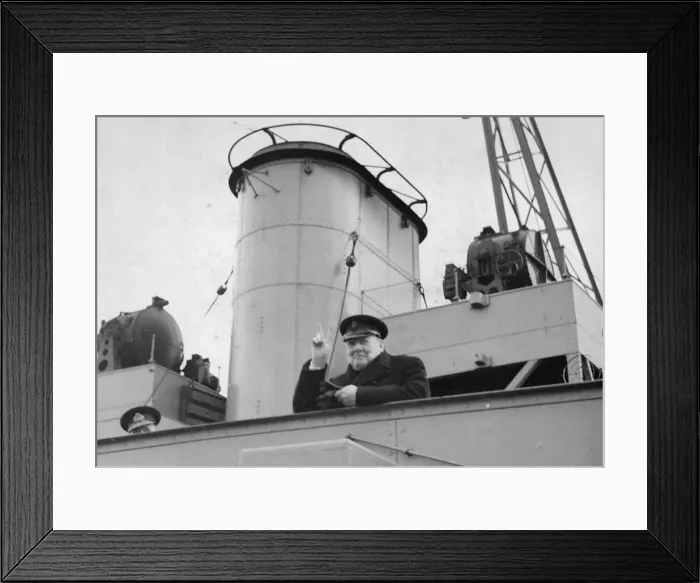 Framed Print : British prime Minister Winston Churchill gives the famous V for victory sign on board a
