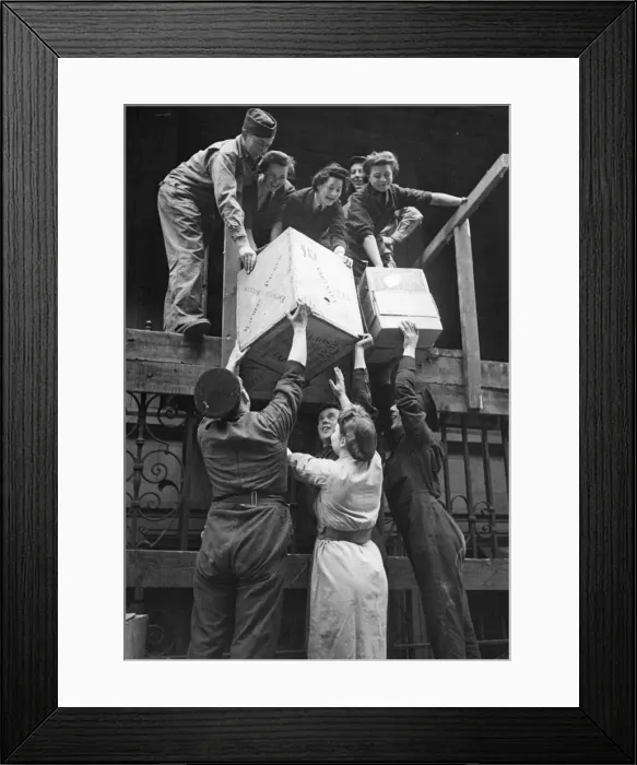 Framed Print : Stage Door Canteen, 201 Piccadilly. Masses of rubbish have to be cleared before Framed Print : Stage Door Canteen, 201 Piccadilly. Masses of rubbish have to be cleared before