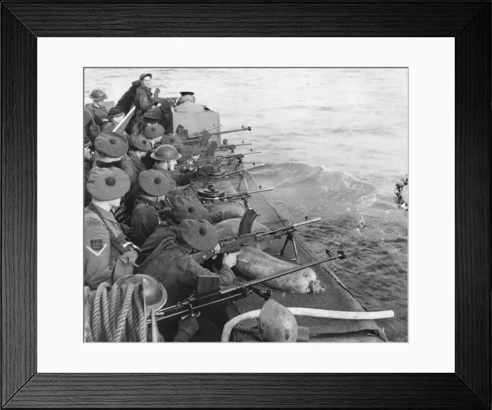 Framed Print : Troops a board a landing craft give covering fire during combined operations training Framed Print : Troops a board a landing craft give covering fire during combined operations training