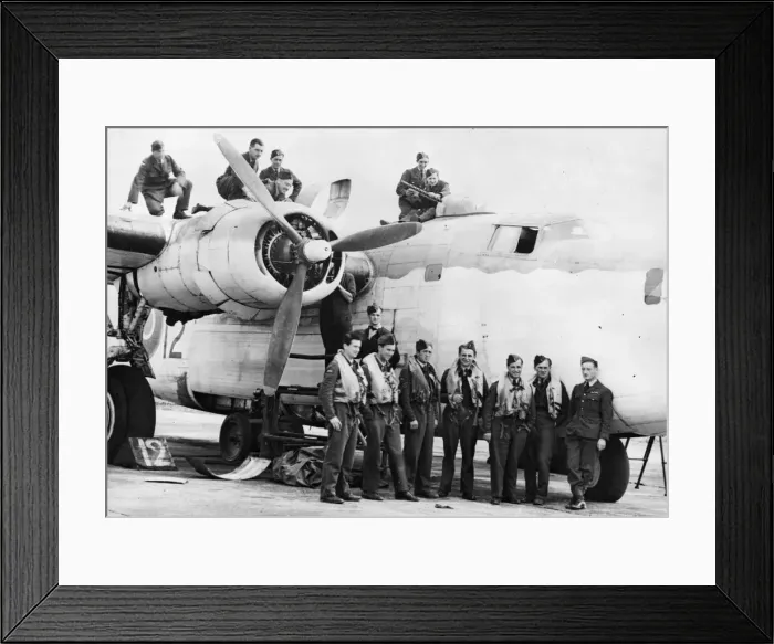 Framed Print : A Czech aircrew stand by their Liberator while the ground crew check it over Framed Print : A Czech aircrew stand by their Liberator while the ground crew check it over
