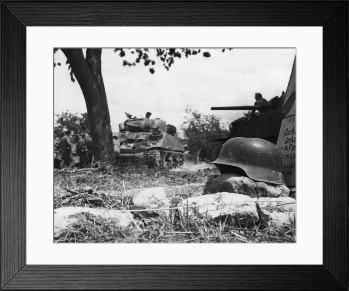 Framed Print : The temporary grave of a German soldier in an orchard near Rauray as elements of the 49th