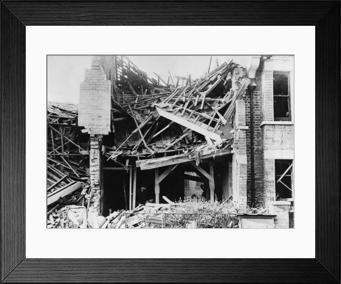 Framed Print : A two storey house was brought down by explosives to reproduce the collapse caused by a Framed Print : A two storey house was brought down by explosives to reproduce the collapse caused by a