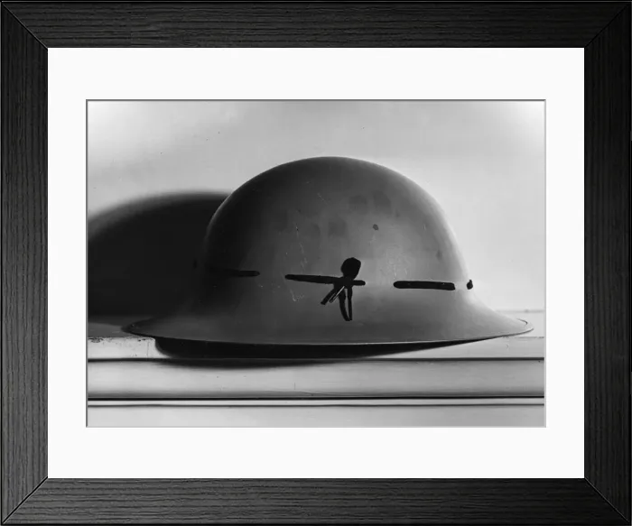 Framed Print : The new steel helmet for use by civilians as announced by Herbert Morrison in the House Framed Print : The new steel helmet for use by civilians as announced by Herbert Morrison in the House
