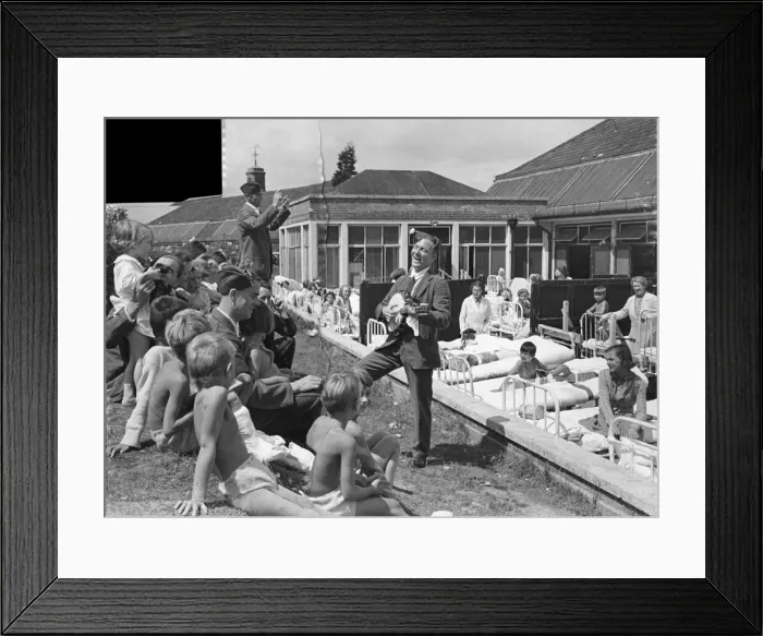 Framed Print : Members of the RAF entertain the children at a childrens hospital. Location unknown Framed Print : Members of the RAF entertain the children at a childrens hospital. Location unknown