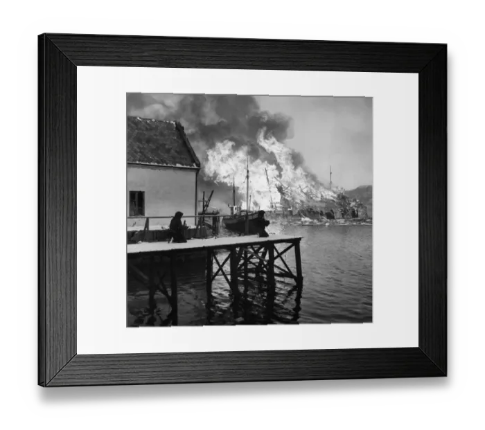 Framed Print : An oil factory burns in Vaagso, 27 December 1941. British troops can be seen on the quay Framed Print : An oil factory burns in Vaagso, 27 December 1941. British troops can be seen on the quay