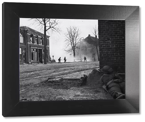 Crossing a road in Gennep which is dominated by enemy fire