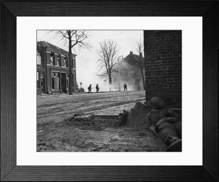 Framed Print : Crossing a road in Gennep which is dominated by enemy fire