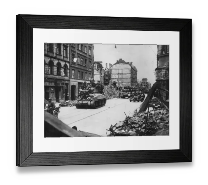Framed Print : Allied tanks laden with infantry move into a heavily bombed Munich on April 29, 1945 Framed Print : Allied tanks laden with infantry move into a heavily bombed Munich on April 29, 1945
