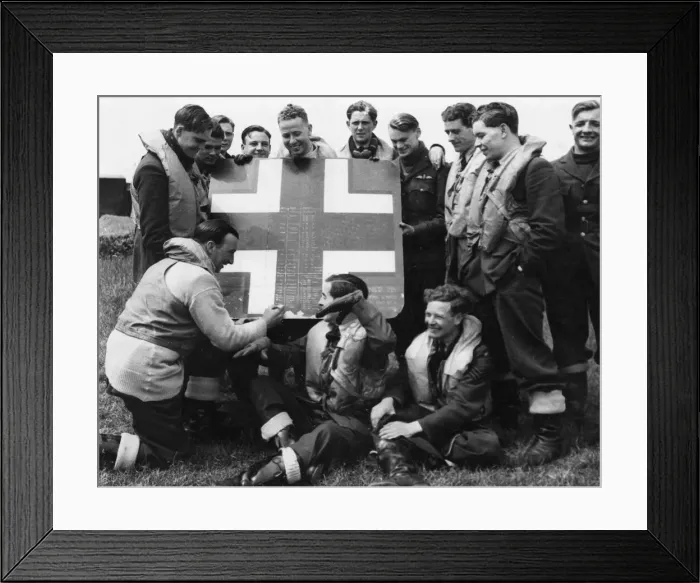 Framed Print : A fragment cut from an enemy aircraft which this RAF squadron shot down is used for Framed Print : A fragment cut from an enemy aircraft which this RAF squadron shot down is used for