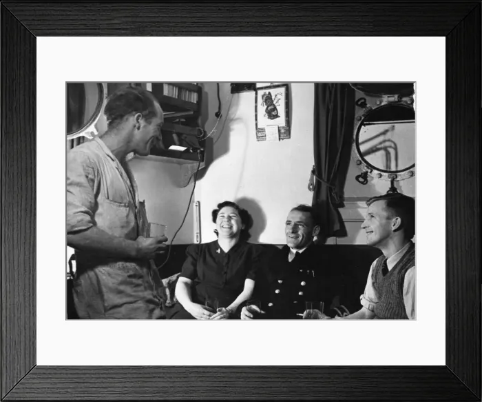 Framed Print : Wives and sweethearts on board SS Empire Faith at a port in the north west of England Framed Print : Wives and sweethearts on board SS Empire Faith at a port in the north west of England