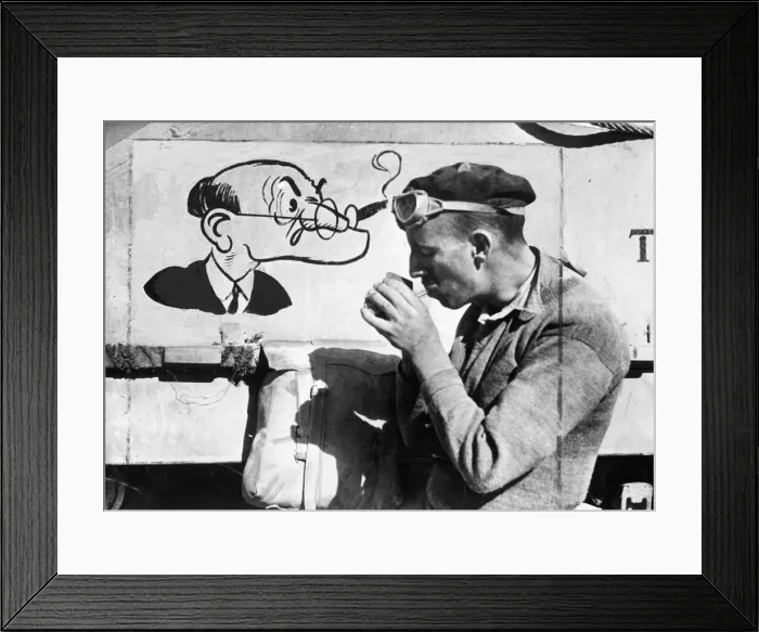 Framed Print : 8th Armys victorious desert drive. Sgt William Lawson Hedges lights a cigarette Framed Print : 8th Armys victorious desert drive. Sgt William Lawson Hedges lights a cigarette