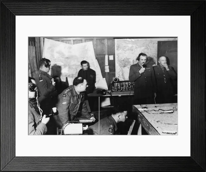 Framed Print : Tank commanders talking on radio telephones as part of a table-top exercise with model Framed Print : Tank commanders talking on radio telephones as part of a table-top exercise with model